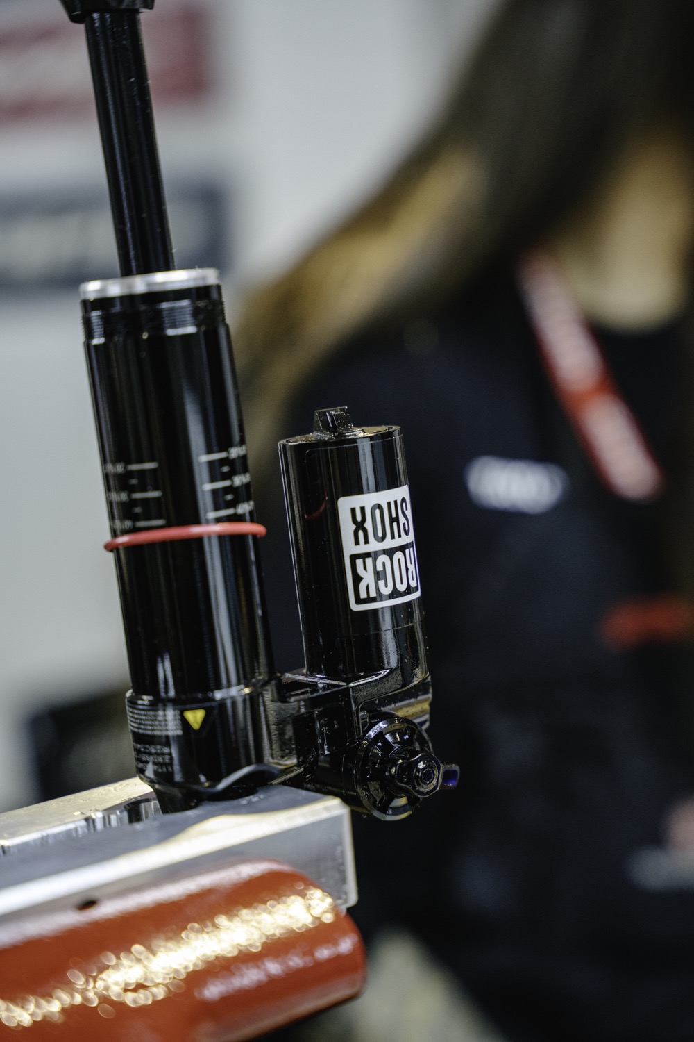 A rear shock on the bench in The Line's workshop, ready for service